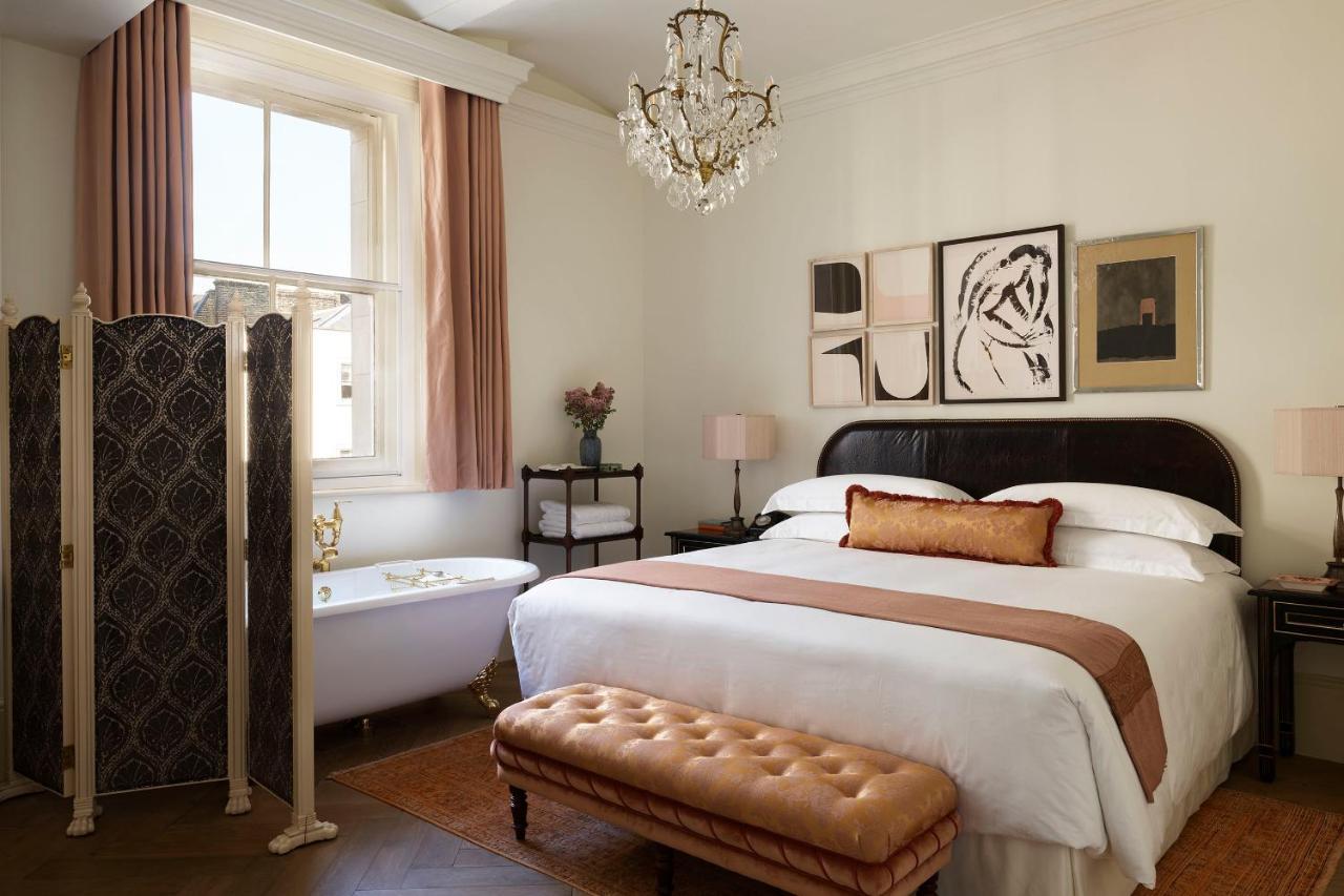Nomad London Hotel Ngoại thất bức ảnh A bedroom at the Hotel George Washington